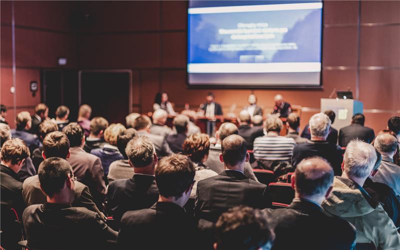 People gathering for a professional community event